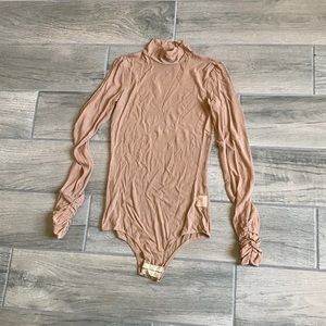 I am Gia mesh long sleeve bodysuit